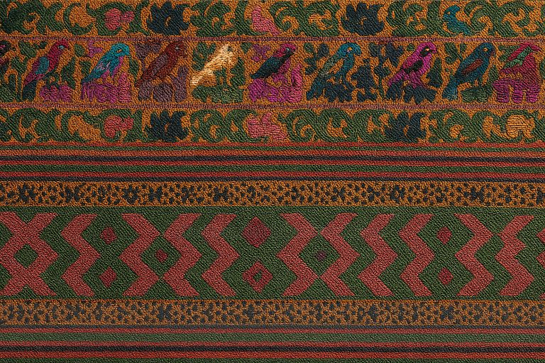 Textil tradicional maya de occidente con patrones zoomorfos y geométricos