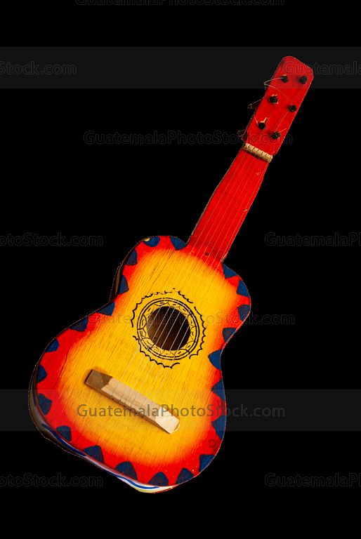Guitarra de juguete, artesania de madera